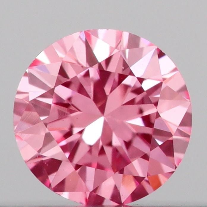 Loose Diamond - ROUND 0.15ct Fancy Vivid Pink VS1: Loose Diamond - ROUND 0.15ct Fancy Vivid Pink VS1 Source: This is a real non-mined Diamond that has been grown in a lab Shape: ROUND Carats: 0.15 Color: Fancy Vivid Pink Certification: IGI Video:
