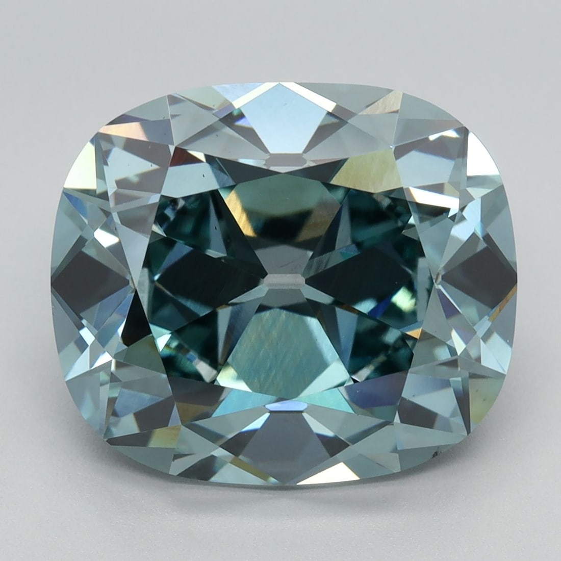 Loose Diamond - CUSHION BRILLIANT 7.16ct Fancy Vivid Blueish Green VS1: Loose Diamond - CUSHION BRILLIANT 7.16ct Fancy Vivid Blueish Green VS1 Source: This is a real non-mined Diamond that has been grown in a lab Shape: CUSHION BRILLIANT Carats: 7.16 Color: Fancy Vivid Bl