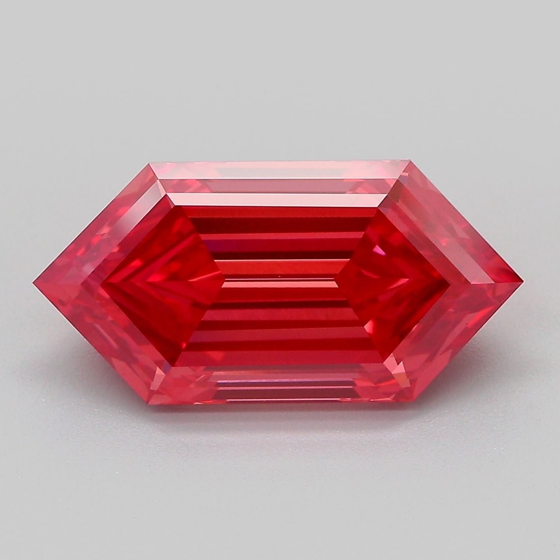 Loose Diamond - HEXAGONAL 5.05ct Fancy Vivid Reddish Pink VS1: Loose Diamond - HEXAGONAL 5.05ct Fancy Vivid Reddish Pink VS1 Source: This is a real non-mined Diamond that has been grown in a lab Shape: HEXAGONAL Carats: 5.05 Color: Fancy Vivid Reddish Pink Certif