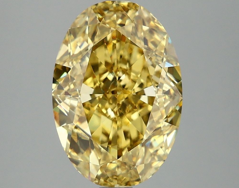 Loose Diamond - OVAL 4.14ct Fancy Vivid Yellow VS1: Loose Diamond - OVAL 4.14ct Fancy Vivid Yellow VS1 Source: This is a real non-mined Diamond that has been grown in a lab Shape: OVAL Carats: 4.14 Color: Fancy Vivid Yellow Certification: IGI Video: