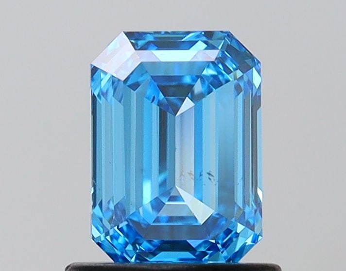Loose Diamond - EMERALD 1.02ct Fancy Vivid Blue VS2: Loose Diamond - EMERALD 1.02ct Fancy Vivid Blue VS2 Source: This is a real non-mined Diamond that has been grown in a lab Shape: EMERALD Carats: 1.02 Color: Fancy Vivid Blue Certification: IGI Video: