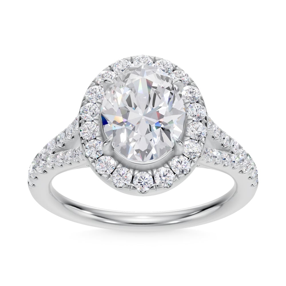 14K White Gold Lab Grown Diamond 2 3/4 Ct.Tw. Oval Shape Halo Engagement Ring: 14K White Gold Lab Grown Diamond 2 3/4 Ct.Tw. Oval Shape Halo Engagement Ring Celebrate your forever moment with the timeless brilliance of our Halo Diamond Engagement Ring. This exquisite piece featu