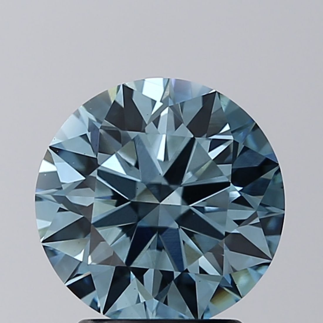 Ideal Loose Diamond - ROUND 2.26ct Fancy Vivid Blue VS2: Ideal Loose Diamond - ROUND 2.26ct Fancy Vivid Blue VS2 Source: This is a real non-mined Diamond that has been grown in a lab Shape: ROUND Carats: 2.26 Color: Fancy Vivid Blue Certification: IGI Video