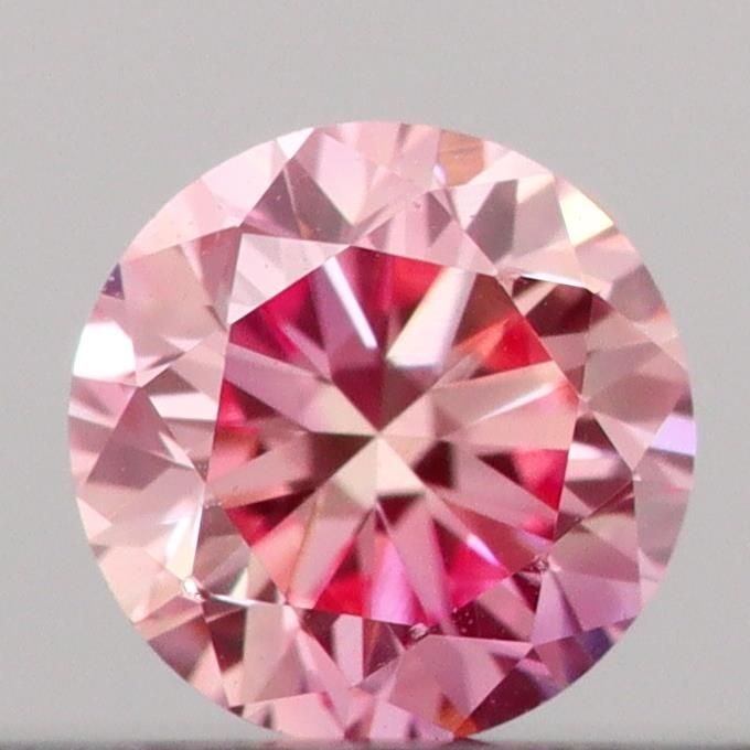 Loose Diamond - ROUND 0.13ct Fancy Intense Pink VS1: Loose Diamond - ROUND 0.13ct Fancy Intense Pink VS1 Source: This is a real non-mined Diamond that has been grown in a lab Shape: ROUND Carats: 0.13 Color: Fancy Intense Pink Certification: IGI Video: