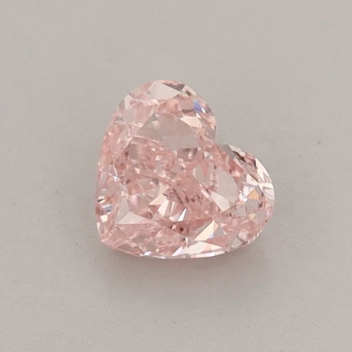 Loose Diamond - HEART 0.64ct Fancy Vivid Pink VVS2: Loose Diamond - HEART 0.64ct Fancy Vivid Pink VVS2 Source: This is a real non-mined Diamond that has been grown in a lab Shape: HEART Carats: 0.64 Color: Fancy Vivid Pink Certification: IGI Video: