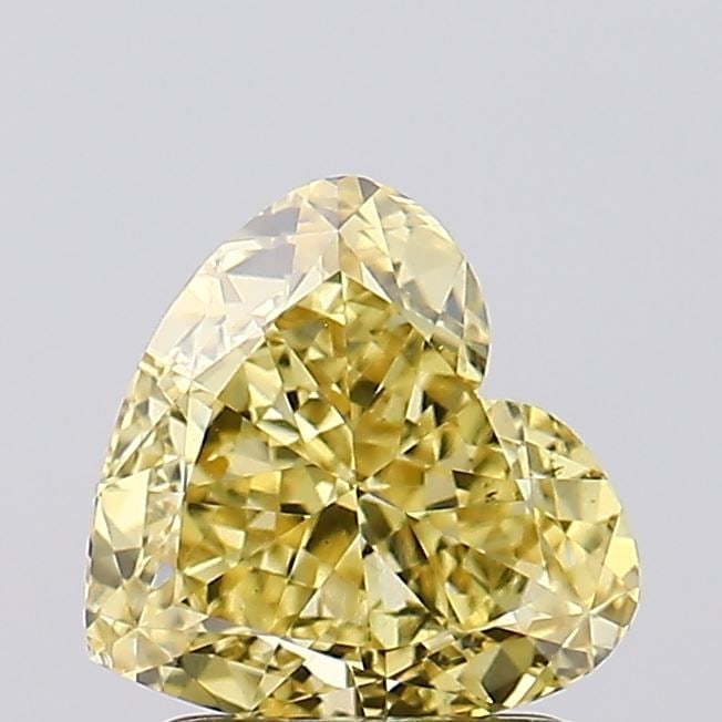 Loose Diamond - HEART 1.71ct Fancy Vivid Yellow VS1: Loose Diamond - HEART 1.71ct Fancy Vivid Yellow VS1 Source: This is a real non-mined Diamond that has been grown in a lab Shape: HEART Carats: 1.71 Color: Fancy Vivid Yellow Certification: IGI Video: