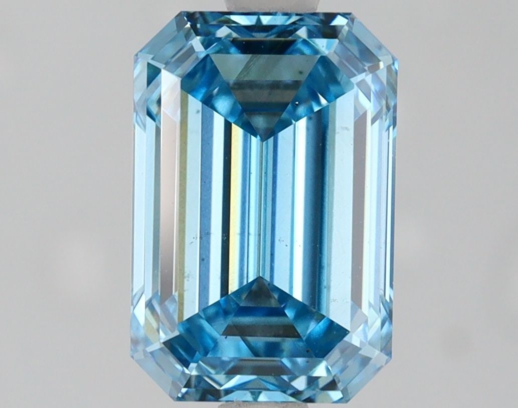 Loose Diamond - EMERALD 2.05ct Fancy Vivid Blue VS2: Loose Diamond - EMERALD 2.05ct Fancy Vivid Blue VS2 Source: This is a real non-mined Diamond that has been grown in a lab Shape: EMERALD Carats: 2.05 Color: Fancy Vivid Blue Certification: IGI Video: