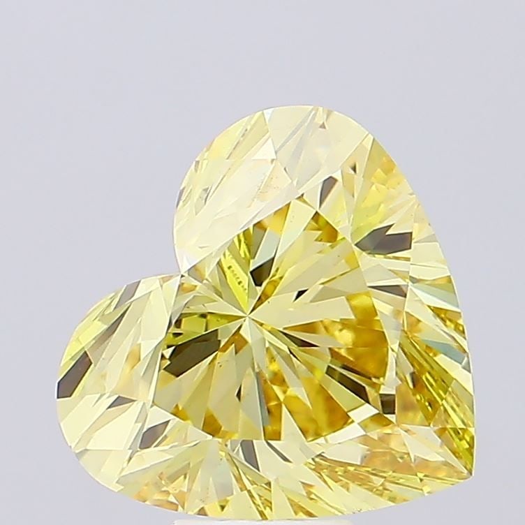 Loose Diamond - HEART 9.68ct Fancy Vivid Yellow VS1: Loose Diamond - HEART 9.68ct Fancy Vivid Yellow VS1 Source: This is a real non-mined Diamond that has been grown in a lab Shape: HEART Carats: 9.68 Color: Fancy Vivid Yellow Certification: IGI Video: