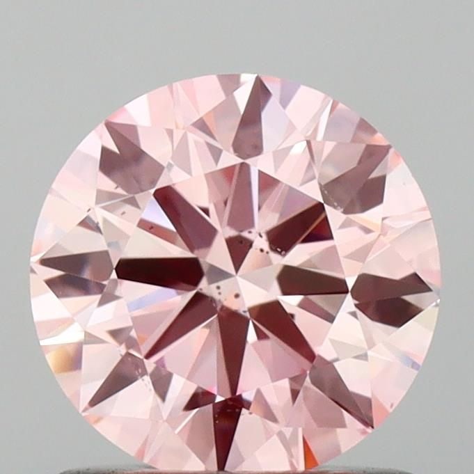 Loose Diamond - ROUND 0.95ct Fancy Pink SI1: Loose Diamond - ROUND 0.95ct Fancy Pink SI1 Source: This is a real non-mined Diamond that has been grown in a lab Shape: ROUND Carats: 0.95 Color: Fancy Pink Certification: IGI Video: