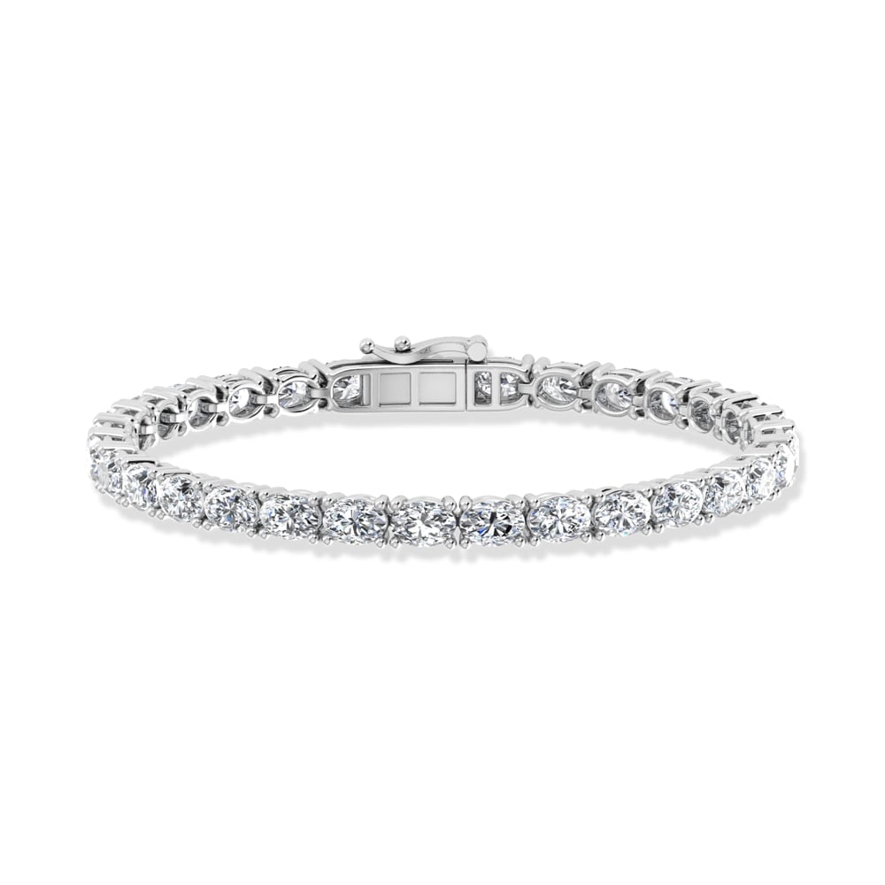 14K White Gold 10 Ct.Tw. Oval Horizontal Shape Lab Grown Diamond Tennis Bracelet: 14K White Gold 10 Ct.Tw. Oval Horizontal Shape Lab Grown Diamond Tennis Bracelet This 14K White Gold tennis bracelet features oval horizontal-shaped lab grown diamonds totaling 10 Ct.Tw., radiating so