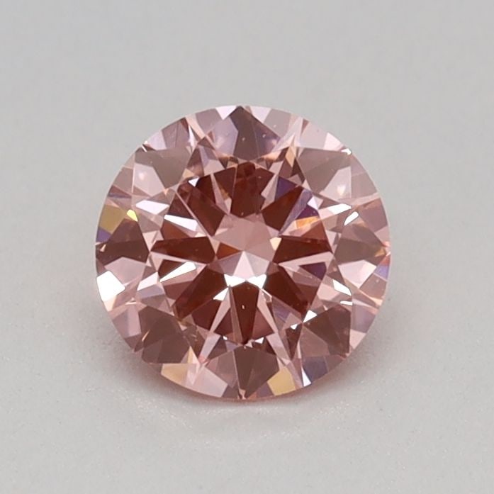 Loose Diamond - ROUND 0.31ct Fancy Vivid Pink VS1: Loose Diamond - ROUND 0.31ct Fancy Vivid Pink VS1 Source: This is a real non-mined Diamond that has been grown in a lab Shape: ROUND Carats: 0.31 Color: Fancy Vivid Pink Certification: IGI Video: