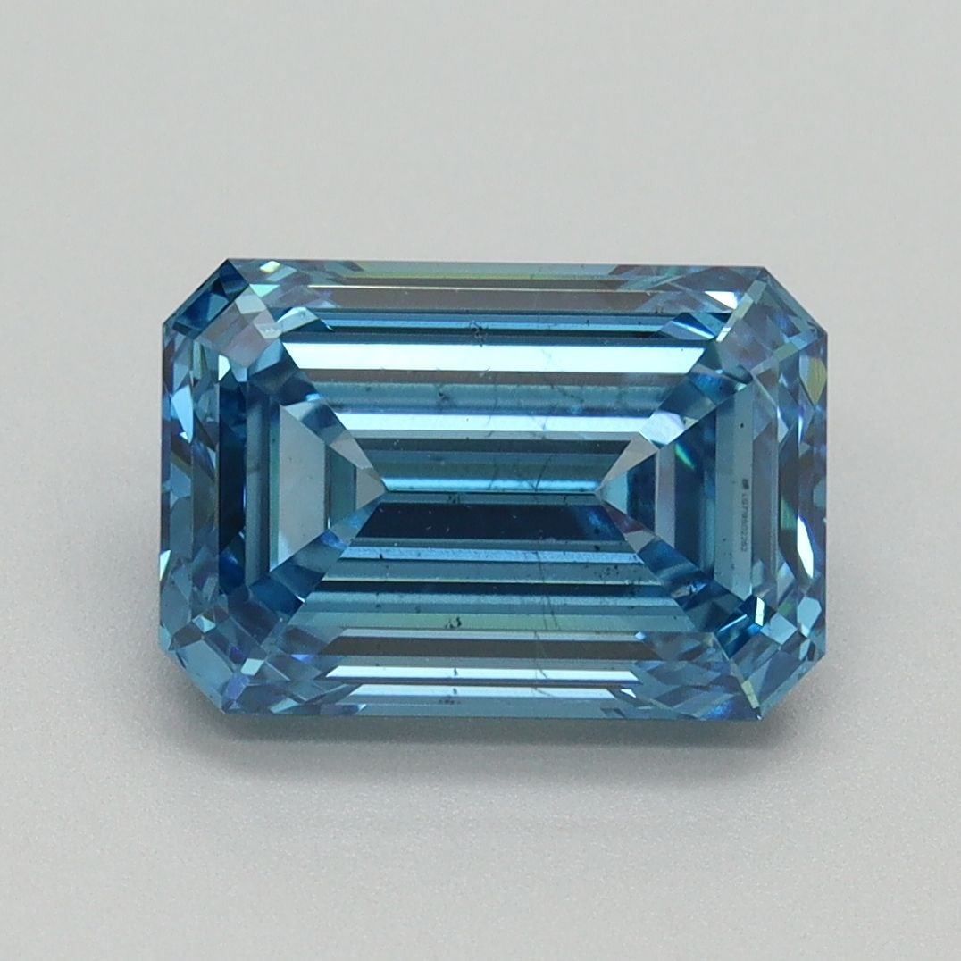 Loose Diamond - EMERALD 3.06ct Fancy Vivid Blue VS2: Loose Diamond - EMERALD 3.06ct Fancy Vivid Blue VS2 Source: This is a real non-mined Diamond that has been grown in a lab Shape: EMERALD Carats: 3.06 Color: Fancy Vivid Blue Certification: IGI Video: