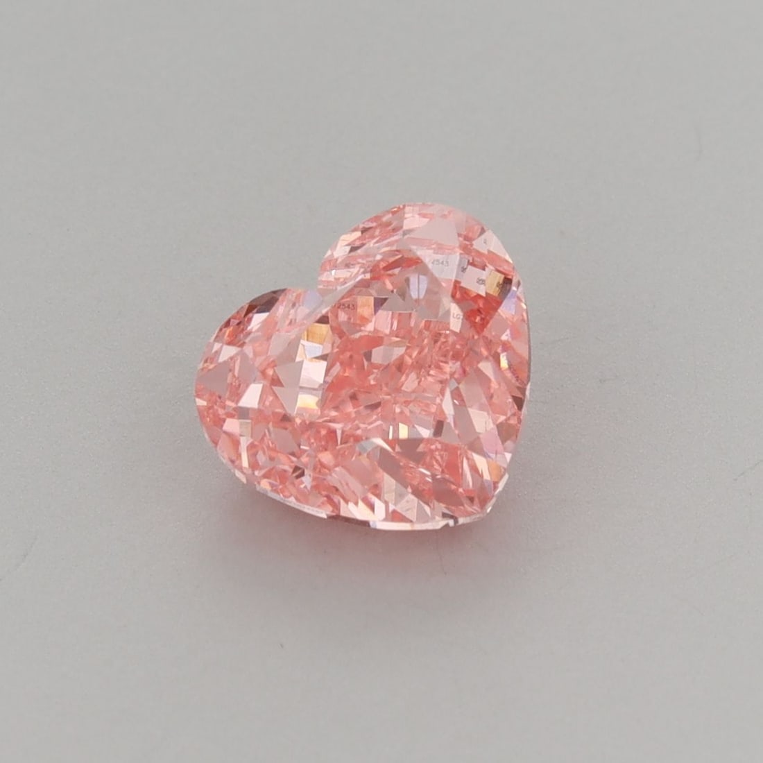 Loose Diamond - HEART 2.0ct Fancy Vivid Pink VS1: Loose Diamond - HEART 2.0ct Fancy Vivid Pink VS1 Source: This is a real non-mined Diamond that has been grown in a lab Shape: HEART Carats: 2.0 Color: Fancy Vivid Pink Certification: IGI Video: