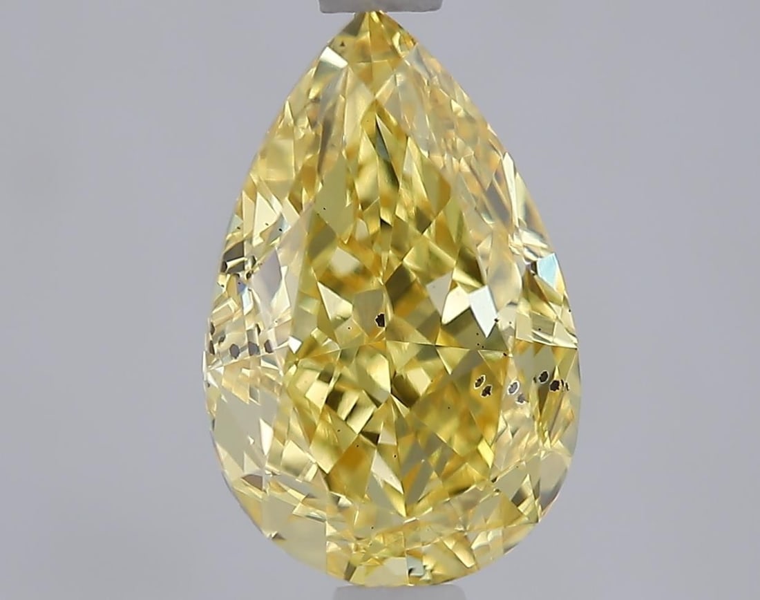 Loose Diamond - PEAR 2.05ct Fancy Vivid Yellow SI1: Loose Diamond - PEAR 2.05ct Fancy Vivid Yellow SI1 Source: This is a real non-mined Diamond that has been grown in a lab Shape: PEAR Carats: 2.05 Color: Fancy Vivid Yellow Certification: IGI Video: