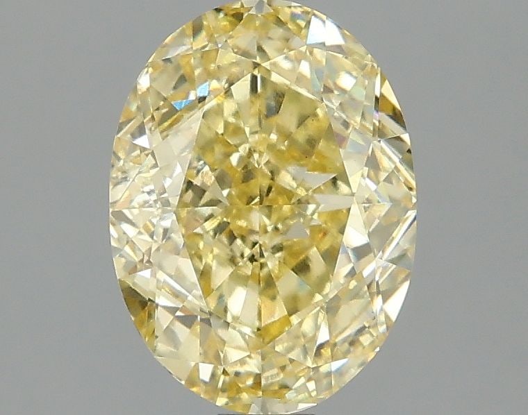 Loose Diamond - OVAL 2.1ct Fancy Vivid Yellow VS1: Loose Diamond - OVAL 2.1ct Fancy Vivid Yellow VS1 Source: This is a real non-mined Diamond that has been grown in a lab Shape: OVAL Carats: 2.1 Color: Fancy Vivid Yellow Certification: IGI Video: