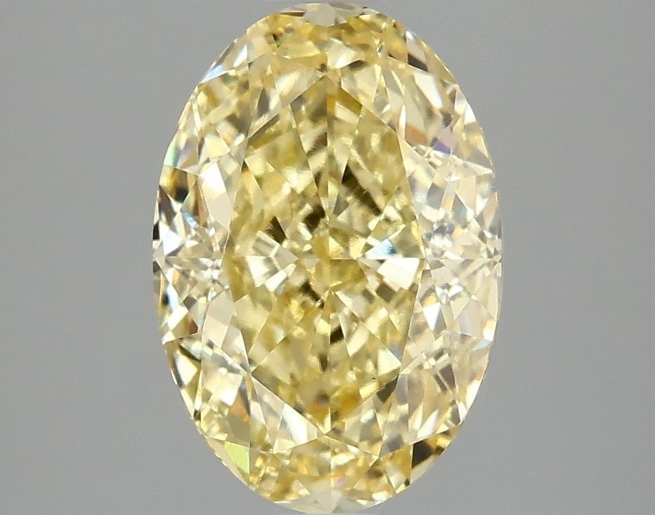 Loose Diamond - OVAL 3.1ct Fancy Vivid Yellow VS1: Loose Diamond - OVAL 3.1ct Fancy Vivid Yellow VS1 Source: This is a real non-mined Diamond that has been grown in a lab Shape: OVAL Carats: 3.1 Color: Fancy Vivid Yellow Certification: IGI Video: