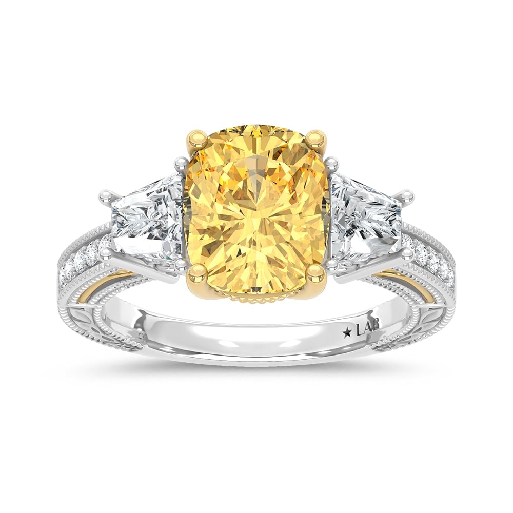 14K Two Tone Gold Lab Grown Diamond 5 1/6 Ct.Tw. Yellow Cushion Engagement Ring (Center 4ct): 14K Two Tone Gold Lab Grown Diamond 5 1/6 Ct.Tw. Yellow Cushion Engagement Ring (Center 4ct) Expertly crafted in 14K Two-Tone Gold, this breathtaking engagement ring showcases a 4 Ct. cushion-cut lab