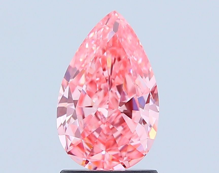 Loose Diamond - PEAR 1.68ct Fancy Vivid Pink VS2: Loose Diamond - PEAR 1.68ct Fancy Vivid Pink VS2 Source: This is a real non-mined Diamond that has been grown in a lab Shape: PEAR Carats: 1.68 Color: Fancy Vivid Pink Certification: IGI Video: