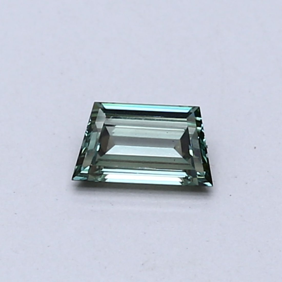 Loose Diamond - TRAPEZOID 0.28ct Fancy Vivid Green VS1: Loose Diamond - TRAPEZOID 0.28ct Fancy Vivid Green VS1 Source: This is a real non-mined Diamond that has been grown in a lab Shape: TRAPEZOID Carats: 0.28 Color: Fancy Vivid Green Certification: NONE