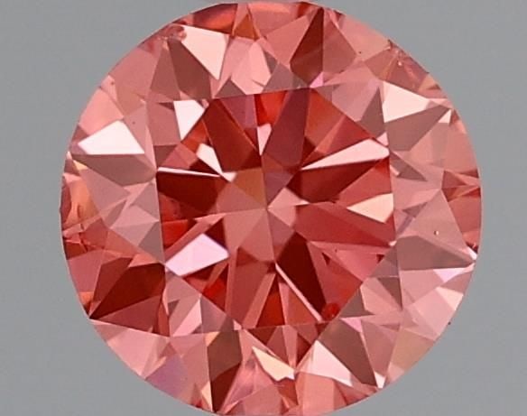 Loose Diamond - ROUND 0.53ct Fancy Vivid Pink SI1: Loose Diamond - ROUND 0.53ct Fancy Vivid Pink SI1 Source: This is a real non-mined Diamond that has been grown in a lab Shape: ROUND Carats: 0.53 Color: Fancy Vivid Pink Certification: IGI Video: