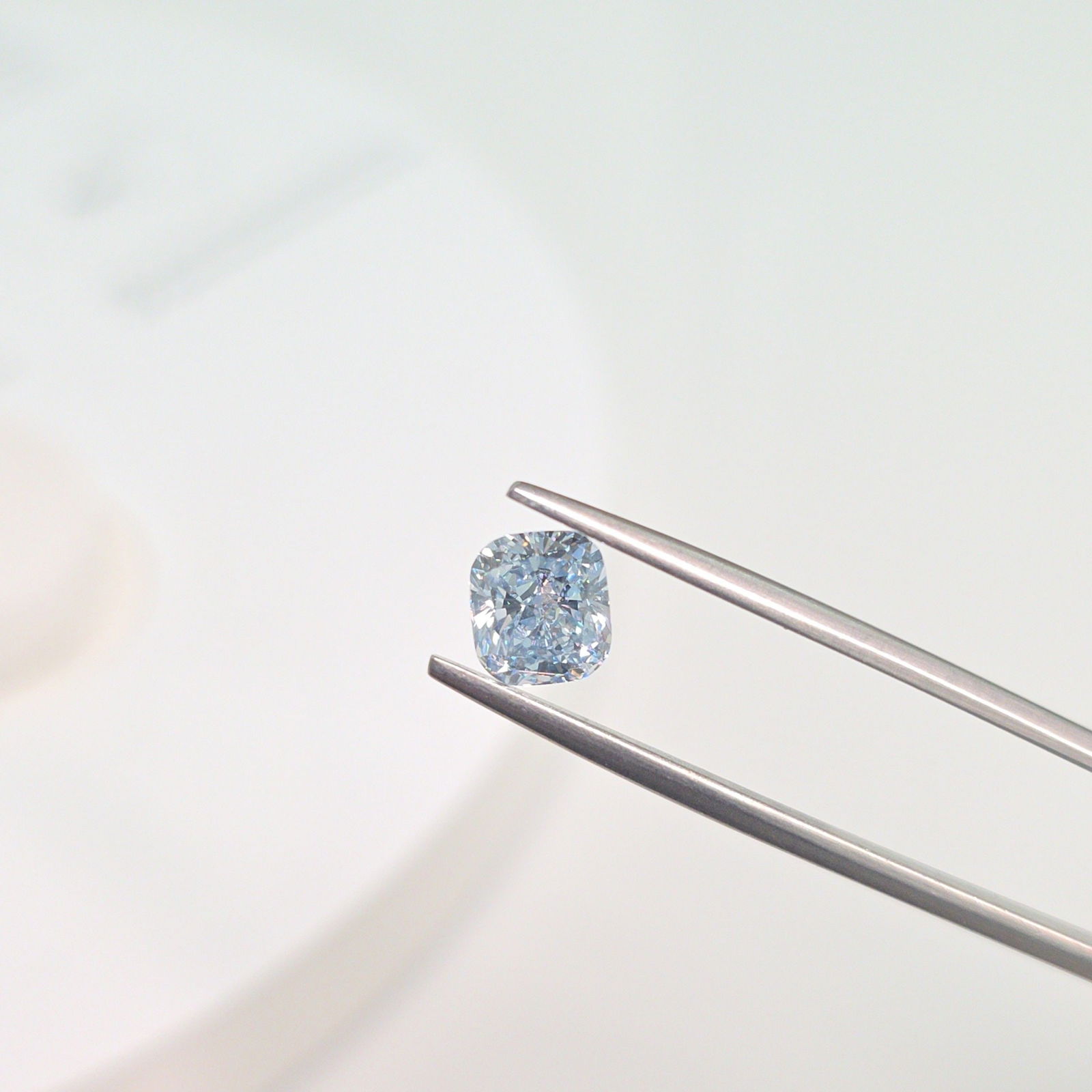 Loose Diamond - CUSHION MODIFIED 1.23ct Fancy Light Blue VS2: Loose Diamond - CUSHION MODIFIED 1.23ct Fancy Light Blue VS2 Source: This is a real non-mined Diamond that has been grown in a lab Shape: CUSHION MODIFIED Carats: 1.23 Color: Fancy Light Blue Certific