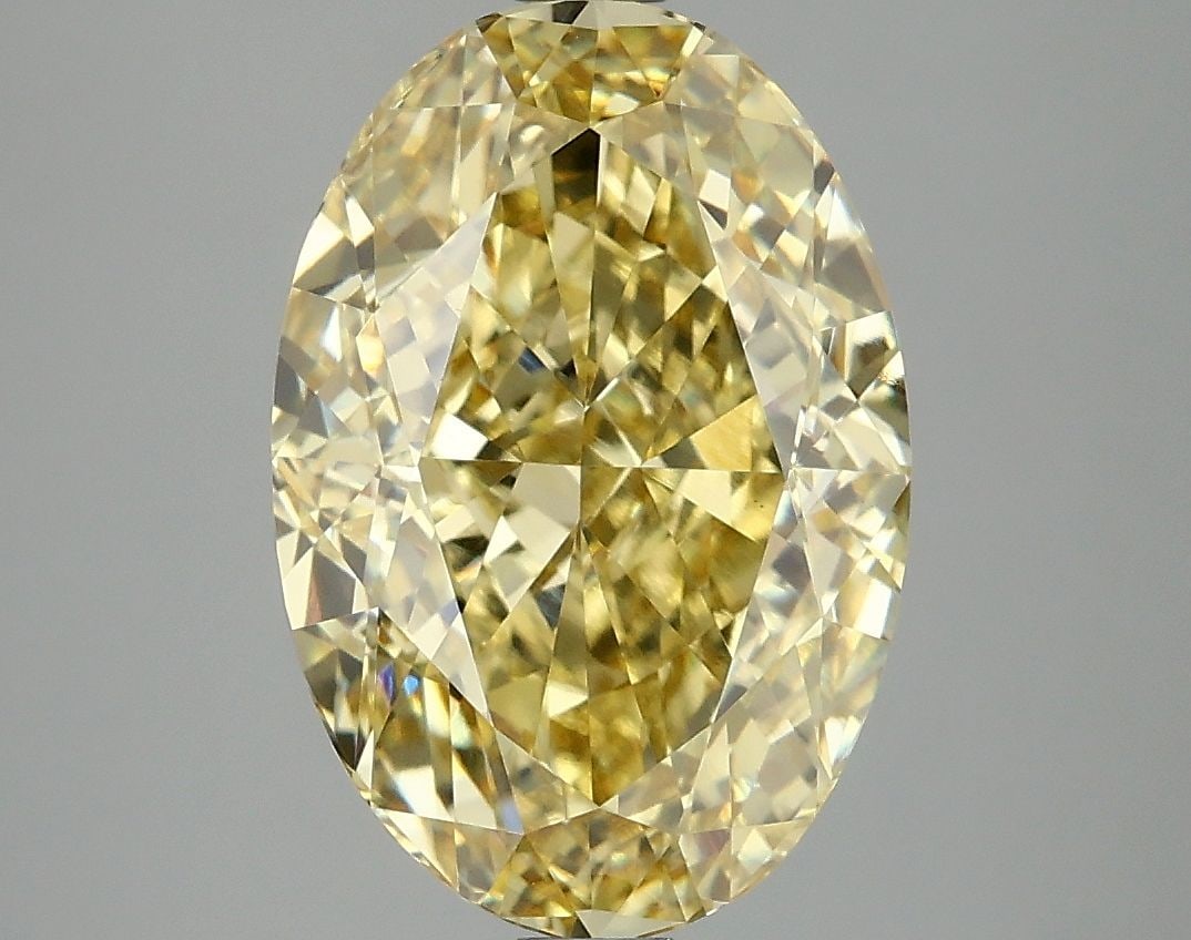 Loose Diamond - OVAL 5.1ct Fancy Intense Yellow VS1: Loose Diamond - OVAL 5.1ct Fancy Intense Yellow VS1 Source: This is a real non-mined Diamond that has been grown in a lab Shape: OVAL Carats: 5.1 Color: Fancy Intense Yellow Certification: IGI Video: