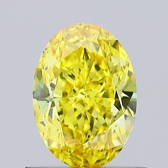 Loose Diamond - OVAL 0.69ct Fancy Vivid Yellow VS1: Loose Diamond - OVAL 0.69ct Fancy Vivid Yellow VS1 Source: This is a real non-mined Diamond that has been grown in a lab Shape: OVAL Carats: 0.69 Color: Fancy Vivid Yellow Certification: IGI Video: