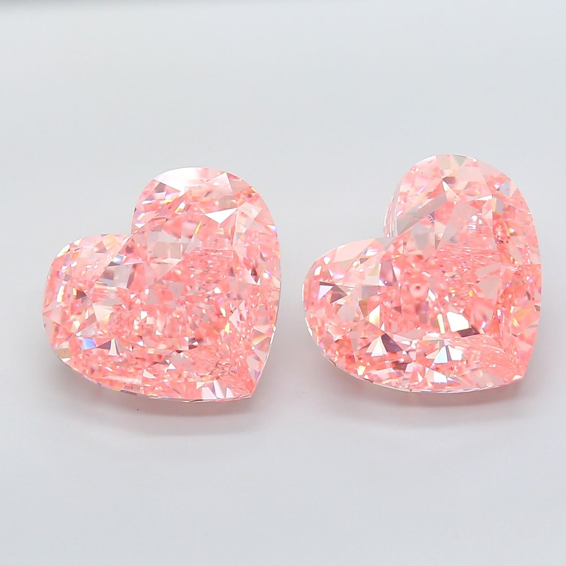Loose Diamond - HEART 30.34ct Fancy Vivid Pink VS1: Loose Diamond - HEART 30.34ct Fancy Vivid Pink VS1 Source: This is a real non-mined Diamond that has been grown in a lab Shape: HEART Carats: 30.34 Color: Fancy Vivid Pink Certification: IGI Video: