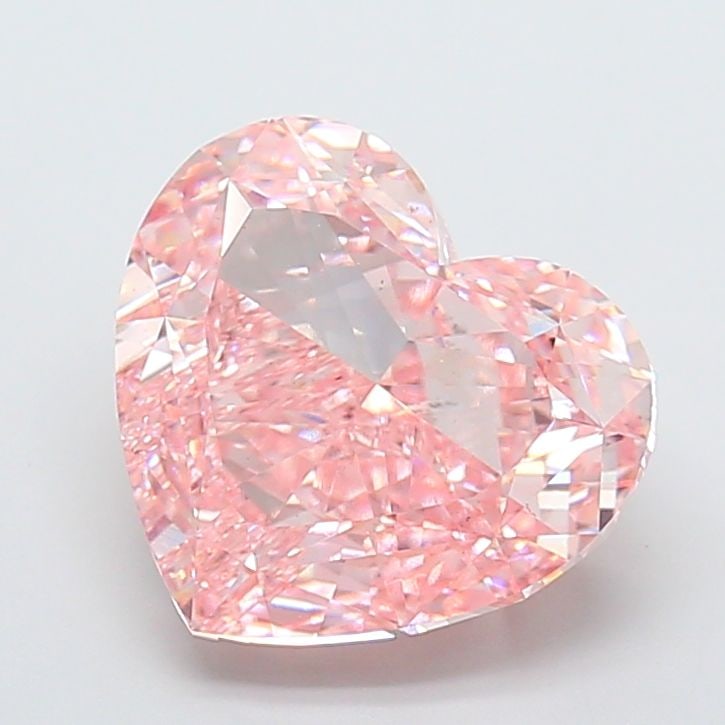 Loose Diamond - HEART 10.05ct Fancy Vivid Pink VS2: Loose Diamond - HEART 10.05ct Fancy Vivid Pink VS2 Source: This is a real non-mined Diamond that has been grown in a lab Shape: HEART Carats: 10.05 Color: Fancy Vivid Pink Certification: IGI Video: