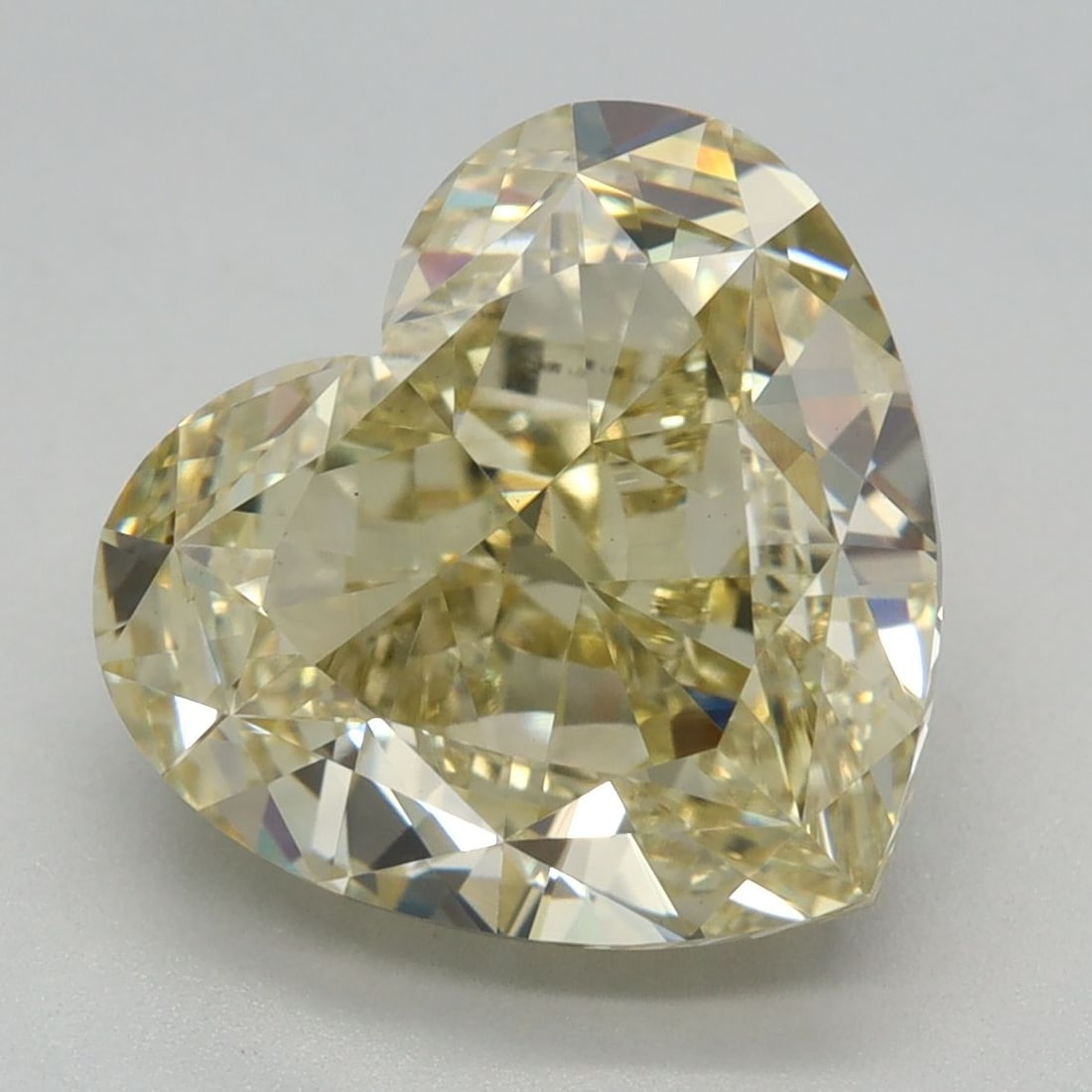 Loose Diamond - HEART 3.73ct Fancy Yellow VVS2: Loose Diamond - HEART 3.73ct Fancy Yellow VVS2 Source: This is a real non-mined Diamond that has been grown in a lab Shape: HEART Carats: 3.73 Color: Fancy Yellow Certification: IGI Video: