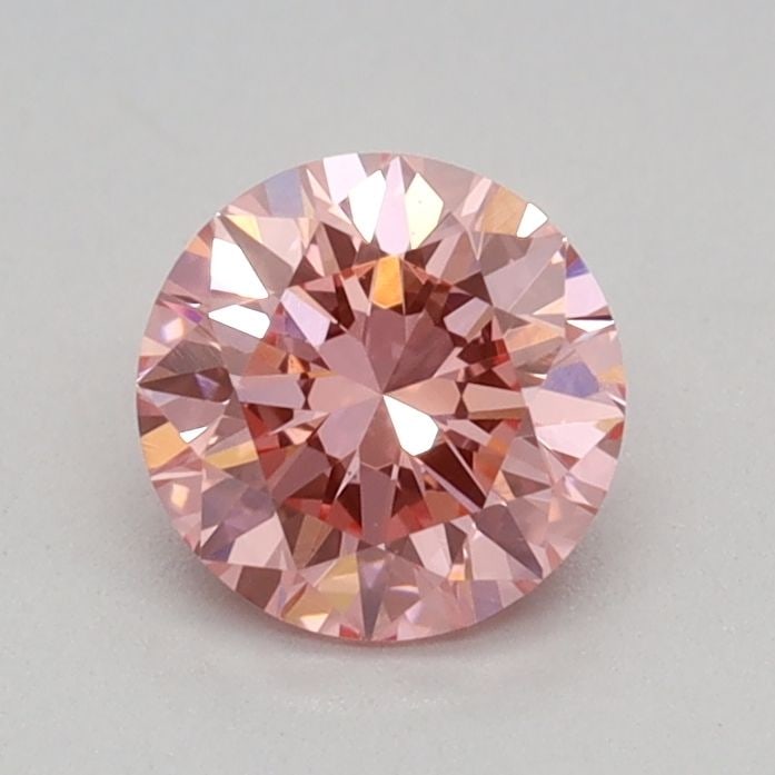 Loose Diamond - ROUND 0.4ct Fancy Vivid Pink VS1: Loose Diamond - ROUND 0.4ct Fancy Vivid Pink VS1 Source: This is a real non-mined Diamond that has been grown in a lab Shape: ROUND Carats: 0.4 Color: Fancy Vivid Pink Certification: IGI Video: