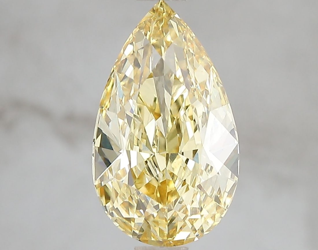 Loose Diamond - PEAR 3.02ct Fancy Vivid Yellow VS1: Loose Diamond - PEAR 3.02ct Fancy Vivid Yellow VS1 Source: This is a real non-mined Diamond that has been grown in a lab Shape: PEAR Carats: 3.02 Color: Fancy Vivid Yellow Certification: IGI Video: