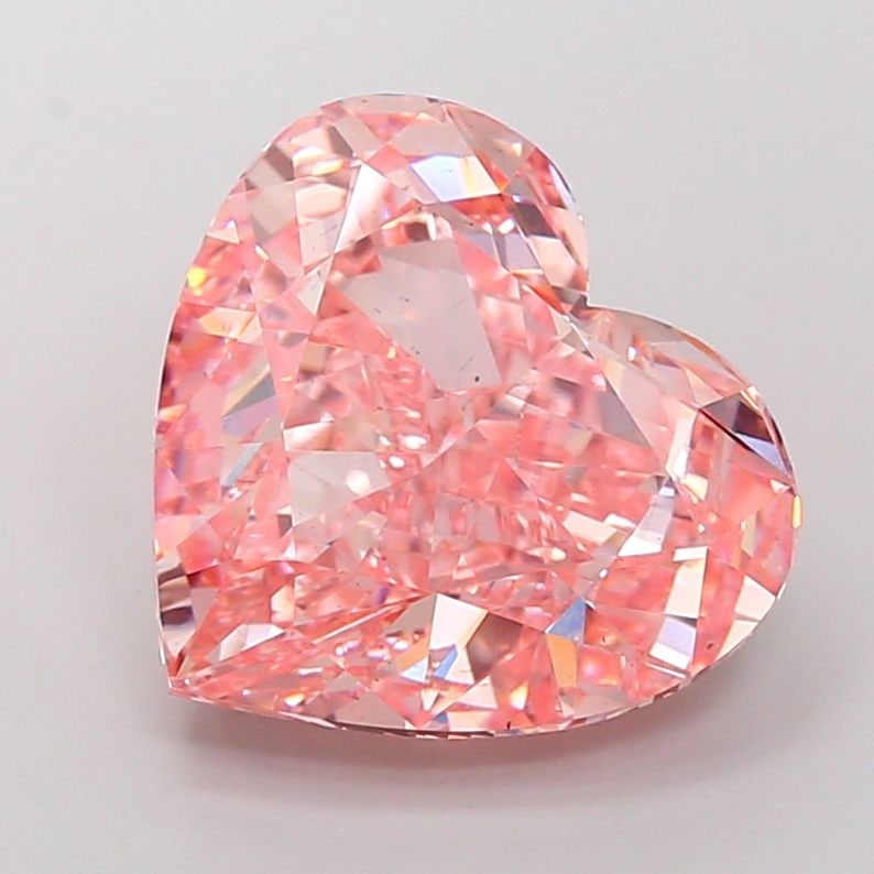 Loose Diamond - HEART 10.06ct Fancy Vivid Pink VS2: Loose Diamond - HEART 10.06ct Fancy Vivid Pink VS2 Source: This is a real non-mined Diamond that has been grown in a lab Shape: HEART Carats: 10.06 Color: Fancy Vivid Pink Certification: IGI Video: