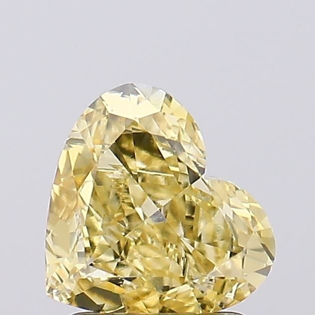 Loose Diamond - HEART 1.55ct Fancy Intense Yellow VVS2: Loose Diamond - HEART 1.55ct Fancy Intense Yellow VVS2 Source: This is a real non-mined Diamond that has been grown in a lab Shape: HEART Carats: 1.55 Color: Fancy Intense Yellow Certification: IGI Vi