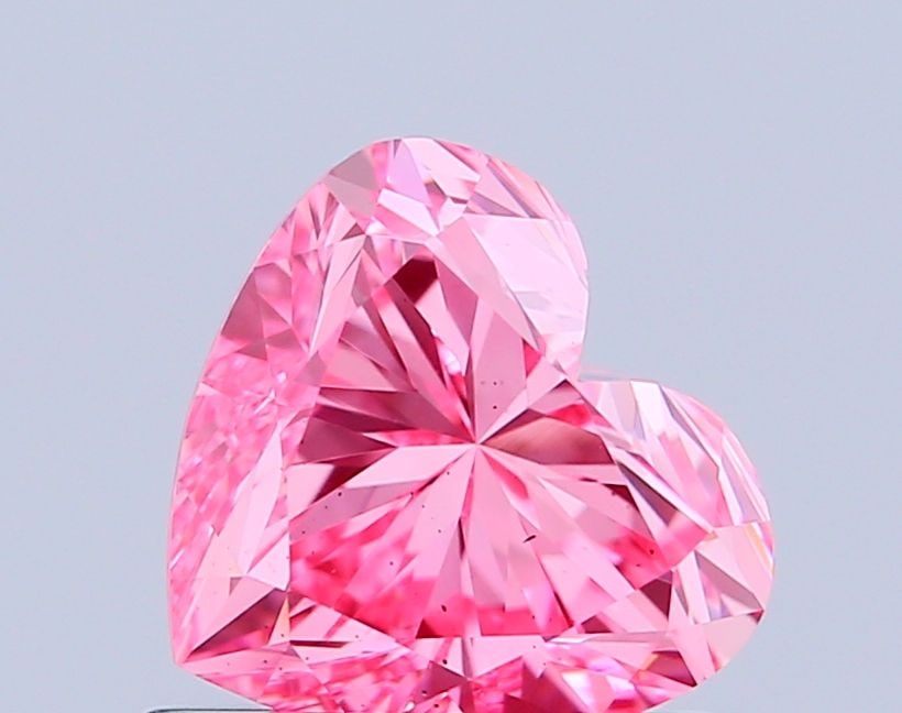 Loose Diamond - HEART 0.89ct Fancy Vivid Pink VS2: Loose Diamond - HEART 0.89ct Fancy Vivid Pink VS2 Source: This is a real non-mined Diamond that has been grown in a lab Shape: HEART Carats: 0.89 Color: Fancy Vivid Pink Certification: IGI Video: