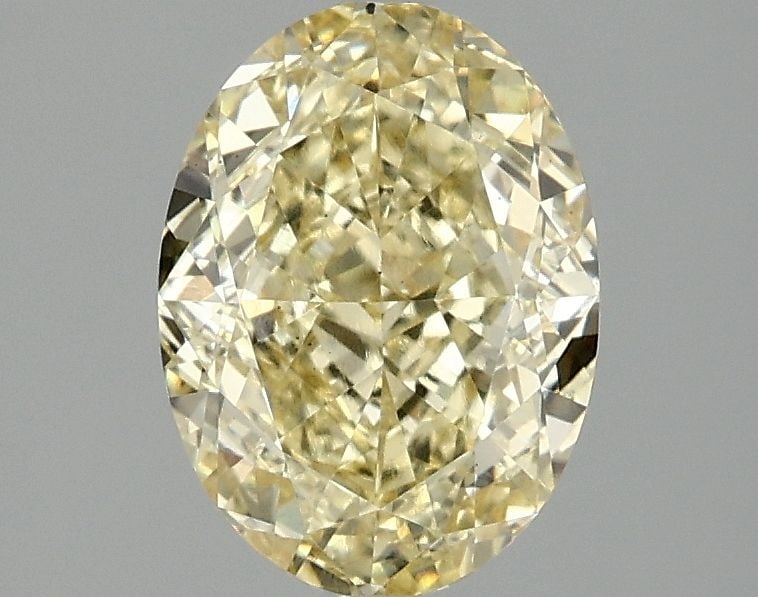 Loose Diamond - OVAL 2.08ct Fancy Vivid Yellow VS2: Loose Diamond - OVAL 2.08ct Fancy Vivid Yellow VS2 Source: This is a real non-mined Diamond that has been grown in a lab Shape: OVAL Carats: 2.08 Color: Fancy Vivid Yellow Certification: IGI Video: