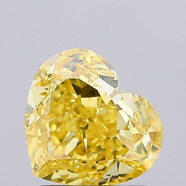Loose Diamond - HEART 1.5ct Fancy Vivid Yellow VS1: Loose Diamond - HEART 1.5ct Fancy Vivid Yellow VS1 Source: This is a real non-mined Diamond that has been grown in a lab Shape: HEART Carats: 1.5 Color: Fancy Vivid Yellow Certification: IGI Video: