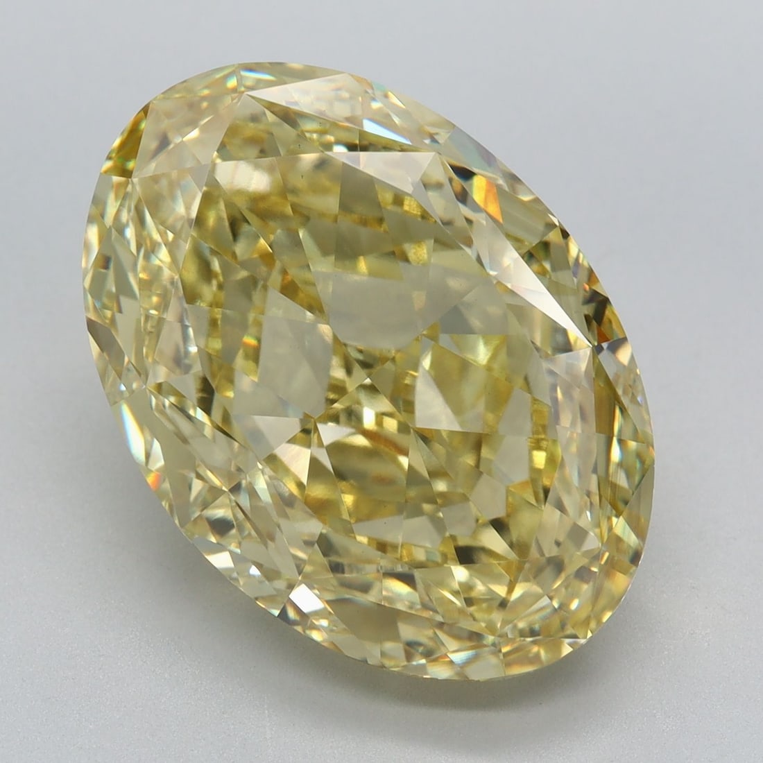 Loose Diamond - OVAL 9.19ct Fancy Intense Yellow VS1: Loose Diamond - OVAL 9.19ct Fancy Intense Yellow VS1 Source: This is a real non-mined Diamond that has been grown in a lab Shape: OVAL Carats: 9.19 Color: Fancy Intense Yellow Certification: IGI Video