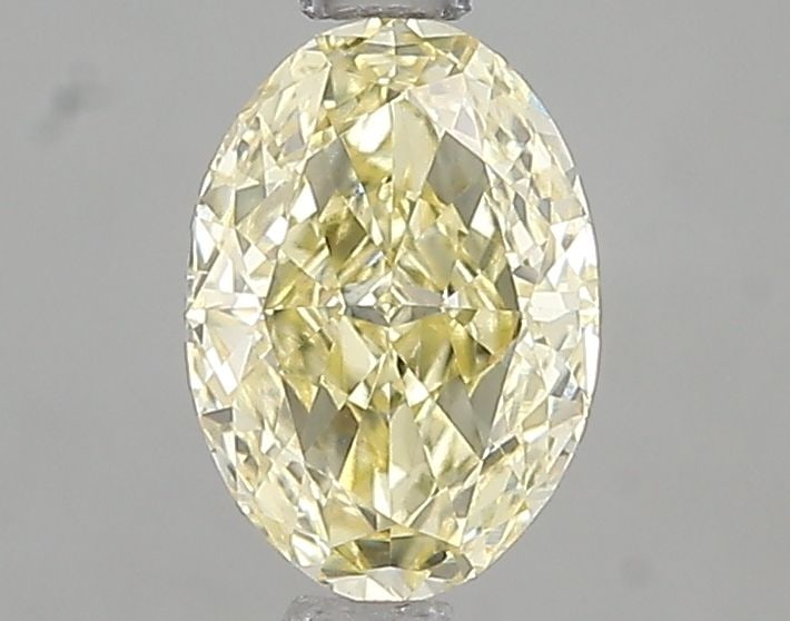 Loose Diamond - OVAL 1.02ct Fancy Yellow VS1: Loose Diamond - OVAL 1.02ct Fancy Yellow VS1 Source: This is a real non-mined Diamond that has been grown in a lab Shape: OVAL Carats: 1.02 Color: Fancy Yellow Certification: IGI Video: