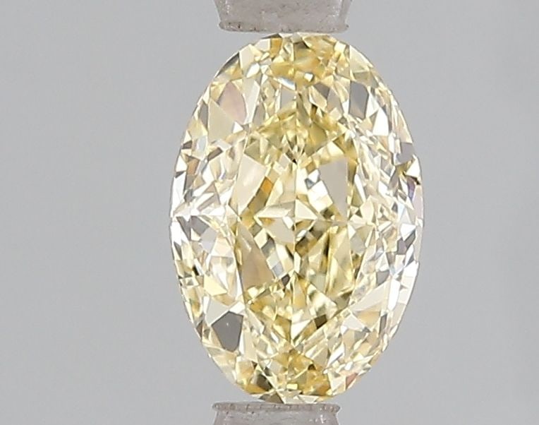 Loose Diamond - OVAL 1.04ct Fancy Intense Yellow VVS2: Loose Diamond - OVAL 1.04ct Fancy Intense Yellow VVS2 Source: This is a real non-mined Diamond that has been grown in a lab Shape: OVAL Carats: 1.04 Color: Fancy Intense Yellow Certification: IGI Vide