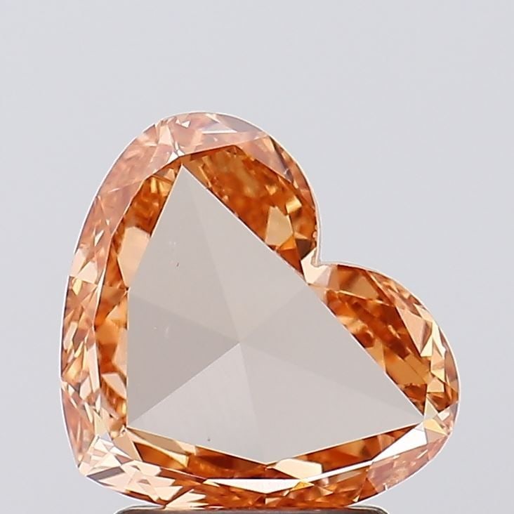 Loose Diamond - HEART 1.39ct Fancy Yellowish Orange VS2: Loose Diamond - HEART 1.39ct Fancy Yellowish Orange VS2 Source: This is a real non-mined Diamond that has been grown in a lab Shape: HEART Carats: 1.39 Color: Fancy Yellowish Orange Certification: IGI