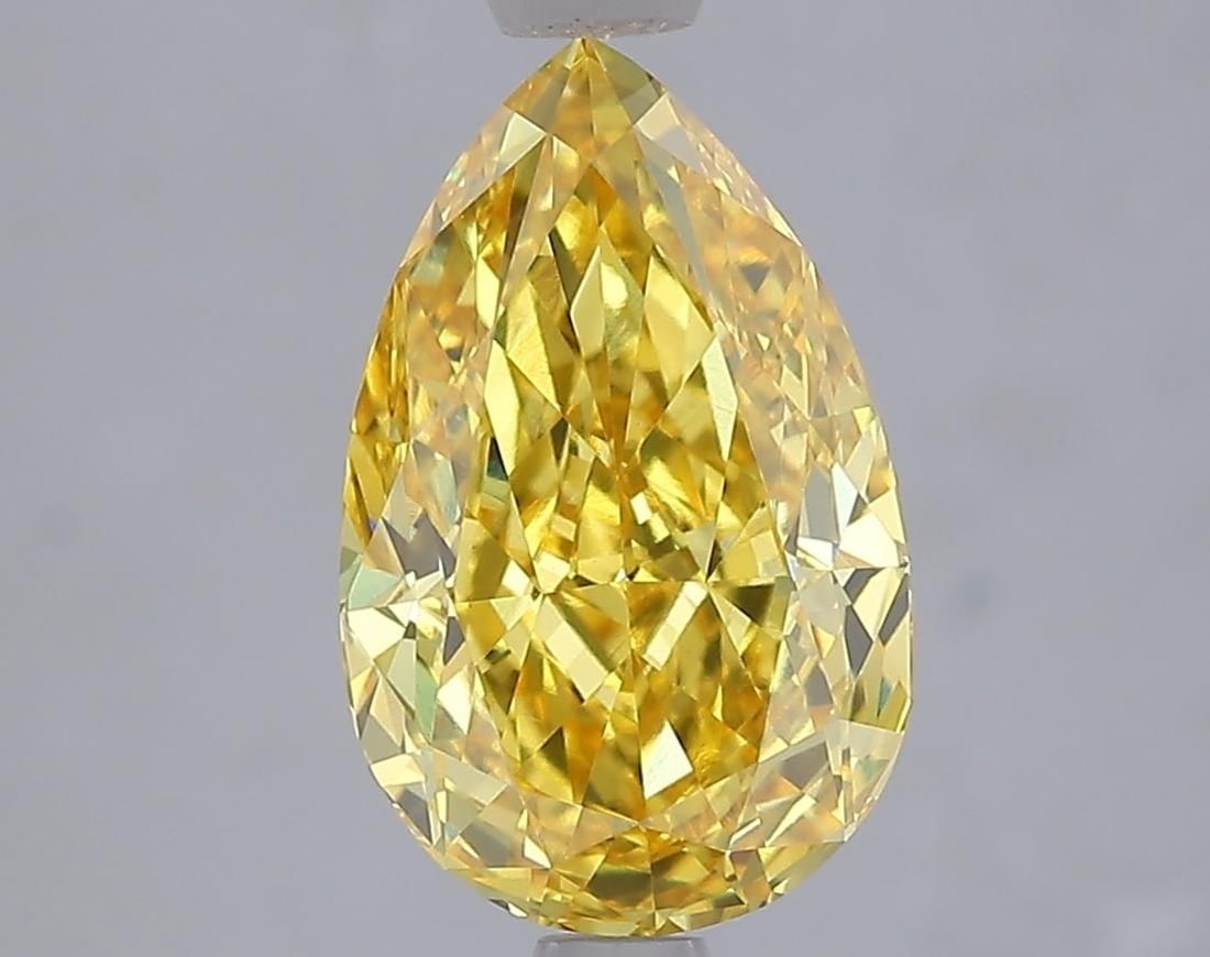 Loose Diamond - PEAR 3.09ct Fancy Vivid Yellow VVS2: Loose Diamond - PEAR 3.09ct Fancy Vivid Yellow VVS2 Source: This is a real non-mined Diamond that has been grown in a lab Shape: PEAR Carats: 3.09 Color: Fancy Vivid Yellow Certification: IGI Video: