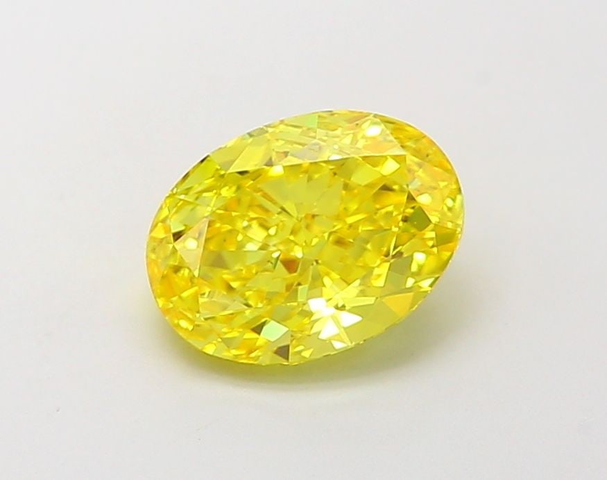 Loose Diamond - OVAL 1.51ct Fancy Vivid Yellow VS1: Loose Diamond - OVAL 1.51ct Fancy Vivid Yellow VS1 Source: This is a real non-mined Diamond that has been grown in a lab Shape: OVAL Carats: 1.51 Color: Fancy Vivid Yellow Certification: IGI Video: