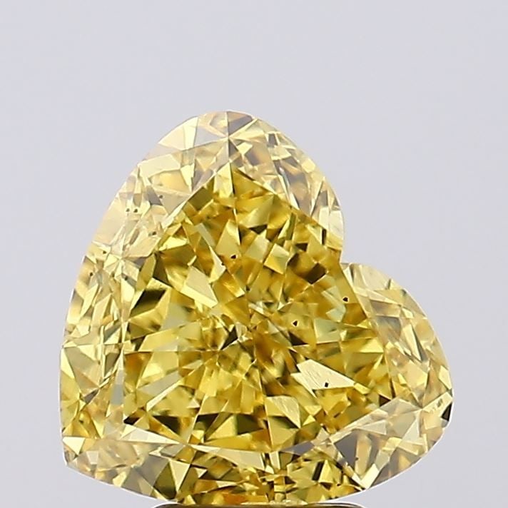 Loose Diamond - HEART 4.54ct Fancy Vivid Yellow SI2: Loose Diamond - HEART 4.54ct Fancy Vivid Yellow SI2 Source: This is a real non-mined Diamond that has been grown in a lab Shape: HEART Carats: 4.54 Color: Fancy Vivid Yellow Certification: IGI Video: