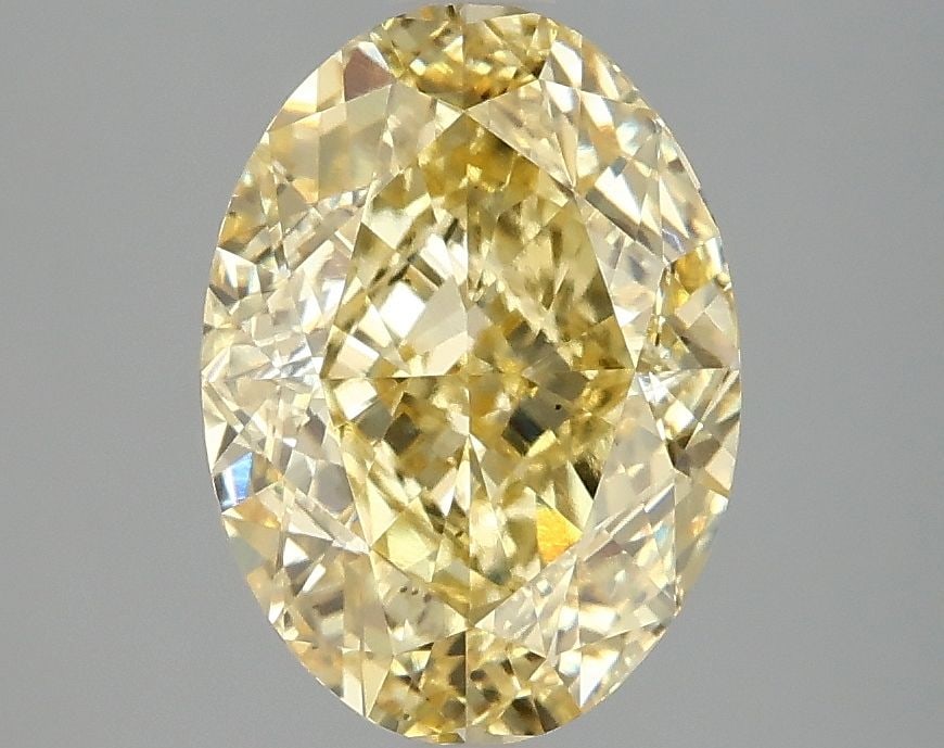 Loose Diamond - OVAL 3.06ct Fancy Intense Yellow VS2: Loose Diamond - OVAL 3.06ct Fancy Intense Yellow VS2 Source: This is a real non-mined Diamond that has been grown in a lab Shape: OVAL Carats: 3.06 Color: Fancy Intense Yellow Certification: IGI Video