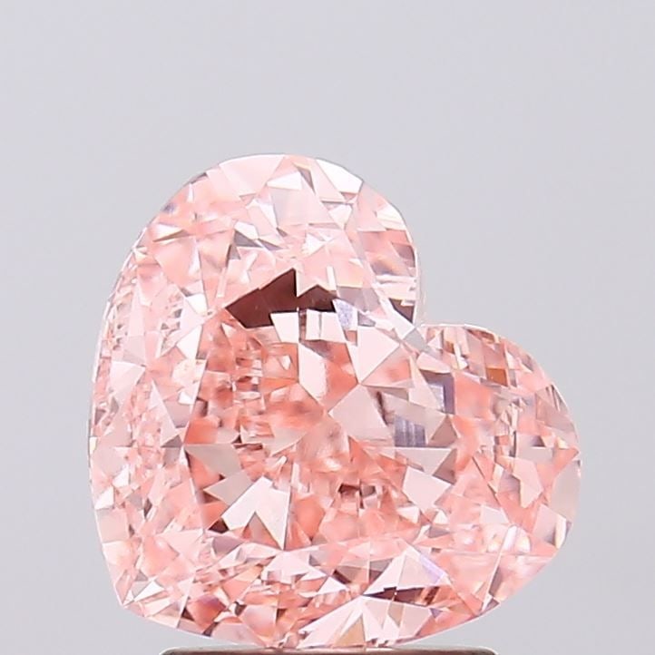 Loose Diamond - HEART 3.26ct Fancy Vivid Pink VS1: Loose Diamond - HEART 3.26ct Fancy Vivid Pink VS1 Source: This is a real non-mined Diamond that has been grown in a lab Shape: HEART Carats: 3.26 Color: Fancy Vivid Pink Certification: IGI Video: