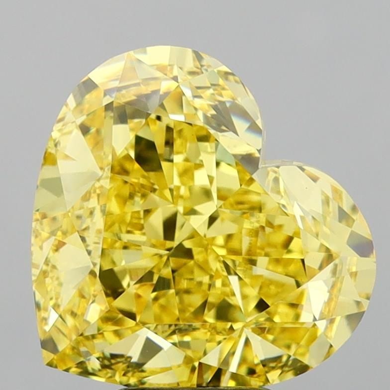 Loose Diamond - HEART 6.59ct Fancy Vivid Yellow VS1: Loose Diamond - HEART 6.59ct Fancy Vivid Yellow VS1 Source: This is a real non-mined Diamond that has been grown in a lab Shape: HEART Carats: 6.59 Color: Fancy Vivid Yellow Certification: IGI Video: