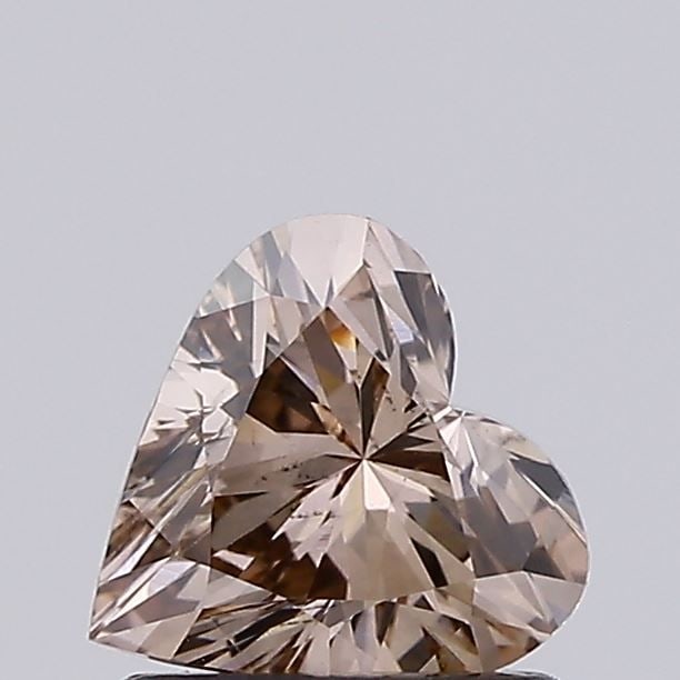 Loose Diamond - HEART 0.83ct Fancy Vivid Brown VS2: Loose Diamond - HEART 0.83ct Fancy Vivid Brown VS2 Source: This is a real non-mined Diamond that has been grown in a lab Shape: HEART Carats: 0.83 Color: Fancy Vivid Brown Certification: NONE Video: