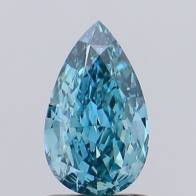 Loose Diamond - PEAR 0.99ct Fancy Vivid Greenish Blue VS1: Loose Diamond - PEAR 0.99ct Fancy Vivid Greenish Blue VS1 Source: This is a real non-mined Diamond that has been grown in a lab Shape: PEAR Carats: 0.99 Color: Fancy Vivid Greenish Blue Certification: