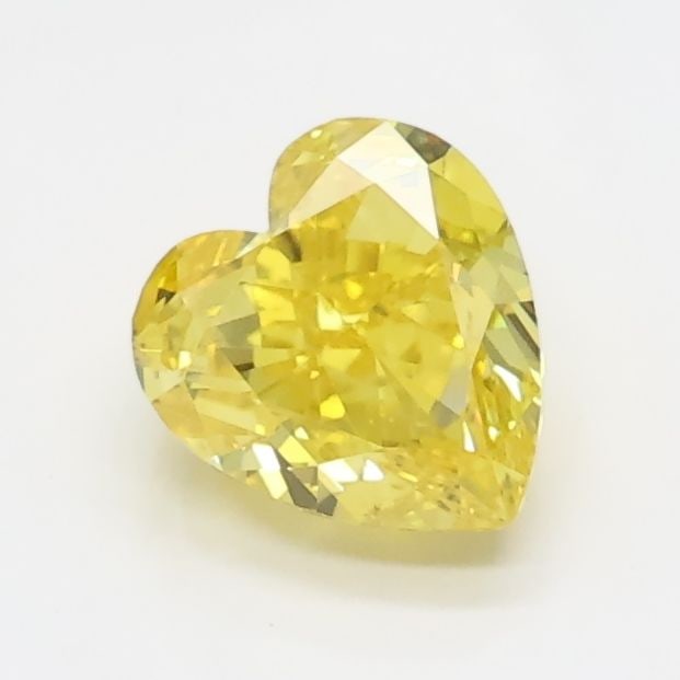 Loose Diamond - HEART 0.79ct Fancy Vivid Yellow VVS1: Loose Diamond - HEART 0.79ct Fancy Vivid Yellow VVS1 Source: This is a real non-mined Diamond that has been grown in a lab Shape: HEART Carats: 0.79 Color: Fancy Vivid Yellow Certification: IGI